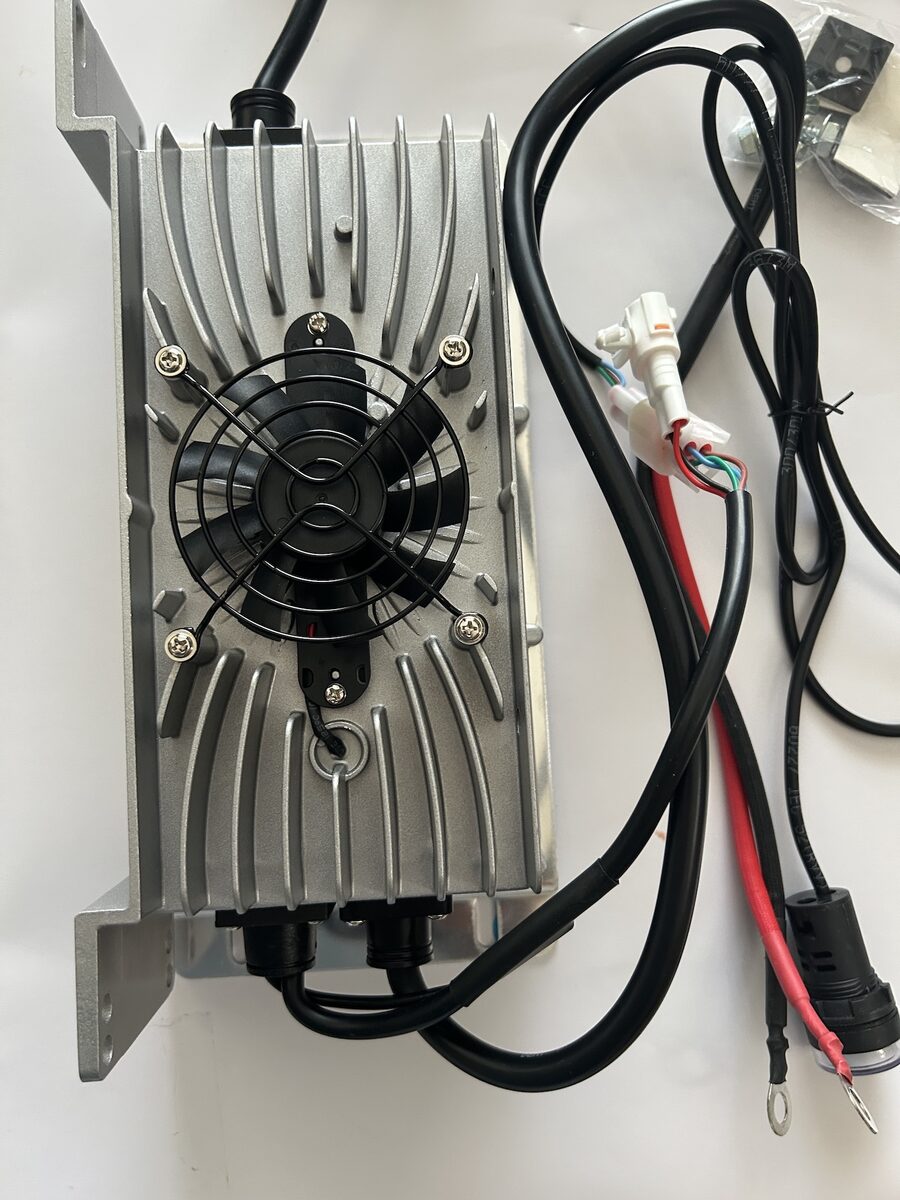 Charger unit with wiring harness and pre-installed ring terminals